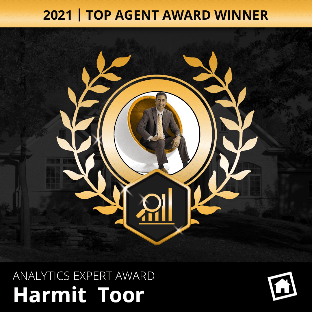 A gold and black award with the words analytics expert award, harmit toor.