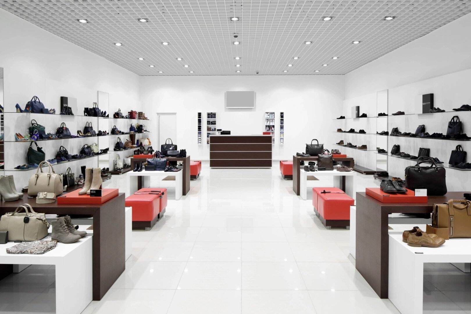 A store with many shoes on display in it.